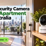 A bright, tidy modern Australian apartment living room with a compact NV NightVision CCTV indoor pan-tilt camera on a shelf beside the front door, city skyline visible through the balcony glass, clean and reassuring mood.